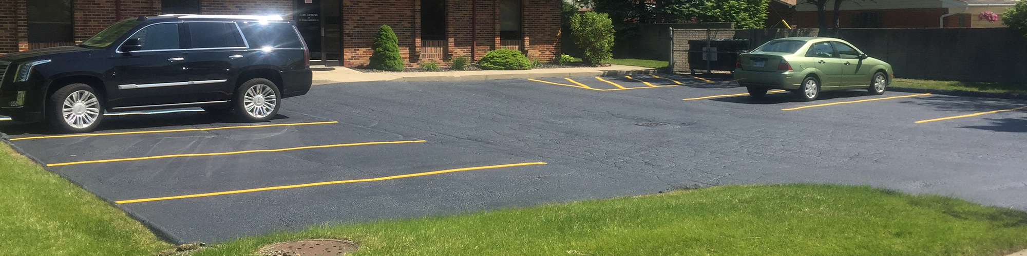 Asphalt Resurfacing In Commercial Parking Lot 